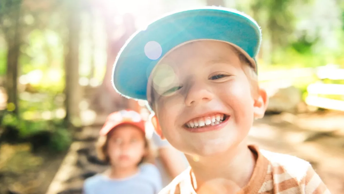 Boy looking into camera smiling